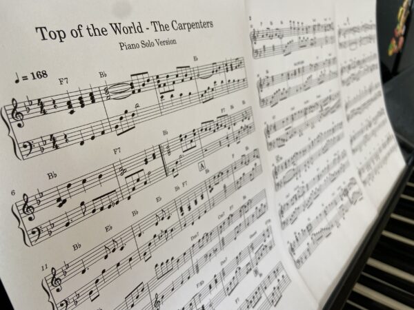 a beautiful, quality piano sheet for the song "Top of the World" by The Carpenters for pianists at the late intermediate / advanced level.